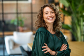 beautiful-woman-smiling-with-crossed-arms